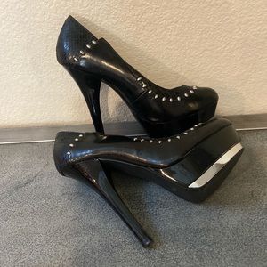 Black Micheal Antonio platform heels